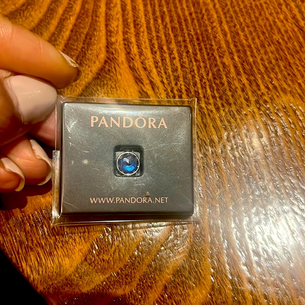 Sapphire Pandora piece to go inside a pandora locket.